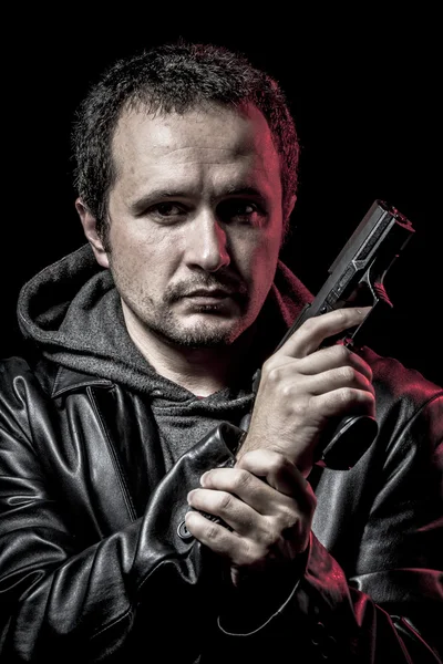 Housebreaker, thief, armed man with black leather jacket, danger — Stock Photo, Image