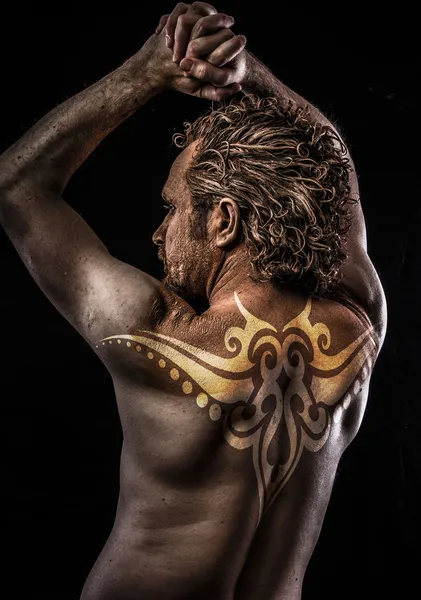 Male model with tribal tattoo — Stock Photo, Image