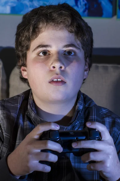 Boy with joystick playing game — Stock Photo, Image