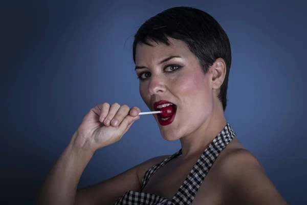 Woman with lollypop — Stock Photo, Image