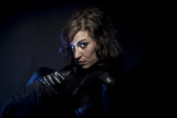 Sexy brunette in black latex costume — Stock Photo, Image