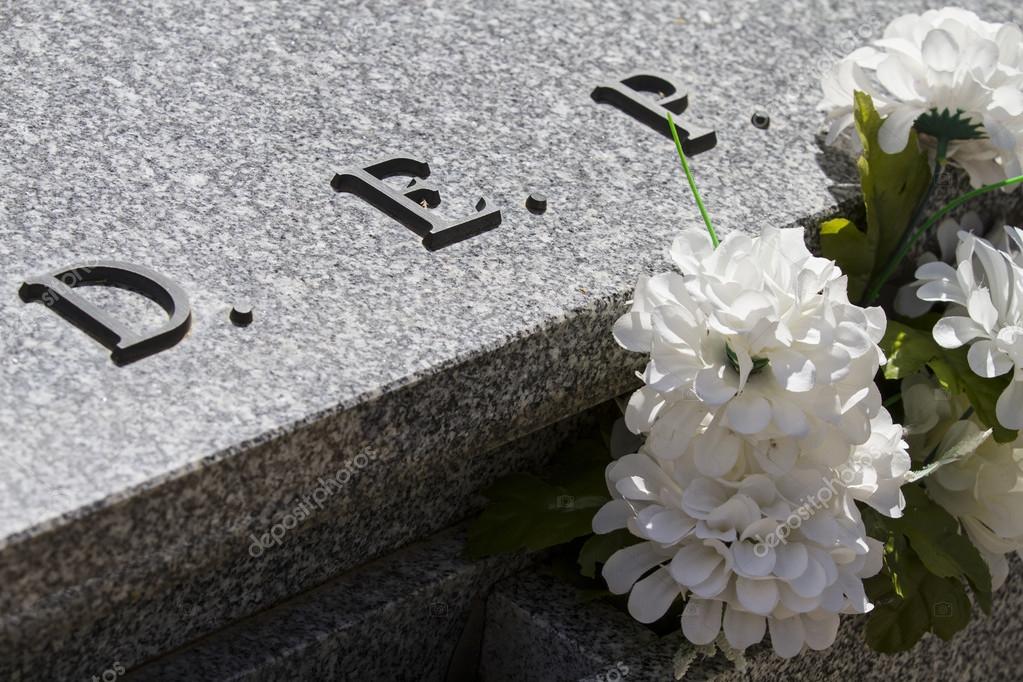 https://st.depositphotos.com/1397034/4383/i/950/depositphotos_43834443-stock-photo-dep-cemetery-detail-with-white.jpg