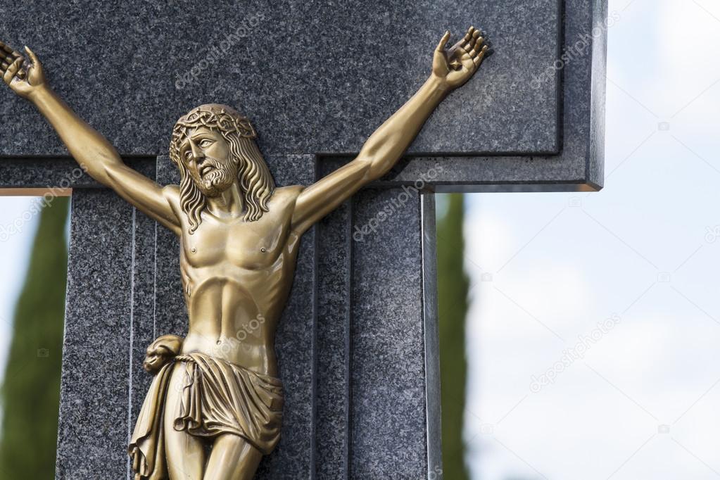 Jesus Christ on the cross in a cemetery