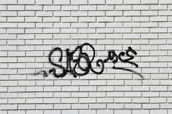 Graffiti op grunge muur — Stockfoto