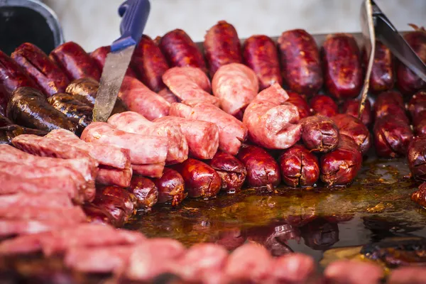 Muchas salchichas y chorizos — Foto de Stock