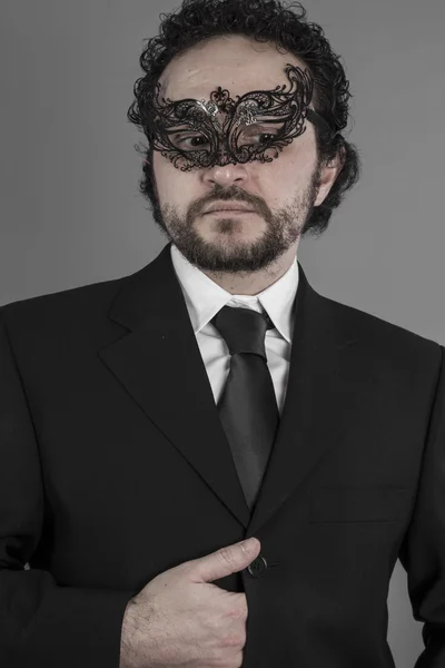 Mysterieuze zakenman met masker — Stockfoto