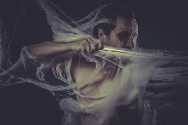 Man trapped in a spider web — Stock Photo, Image