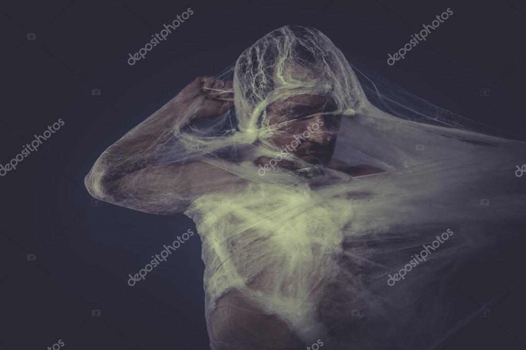 Man trapped in a spider web — Stock Photo © outsiderzone #47167291