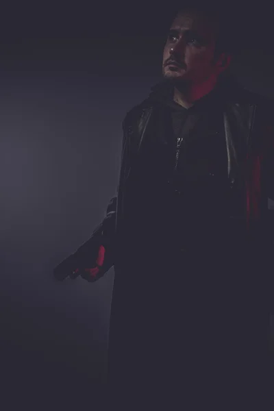 Man with long leather jacket — Stock Photo, Image