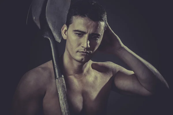 Male worker holding a shovel — Stock Photo, Image