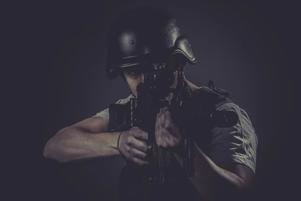 Paintball sport player wearing protective helmet — Stock Photo, Image