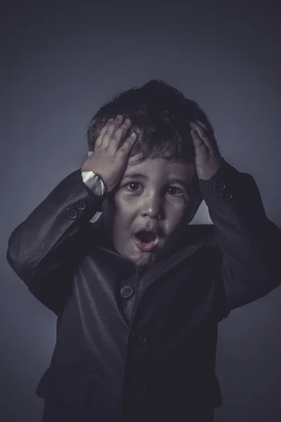 Surprised little business boy — Stock Photo, Image