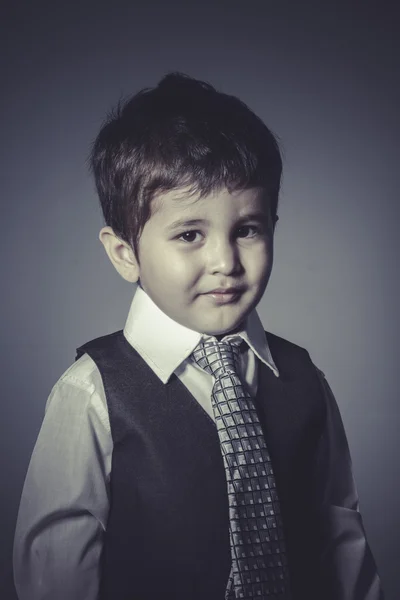 Workaholic boy in suit and tie — Stock Photo, Image