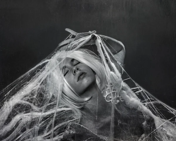 Woman caught in spider web — Stock Photo, Image