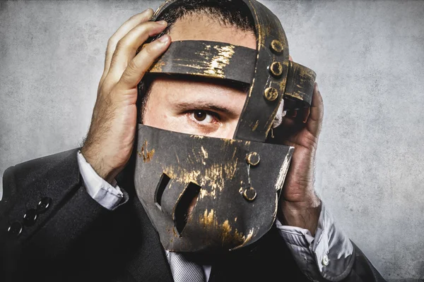 Dangerous business man with iron mask — Stock Photo, Image