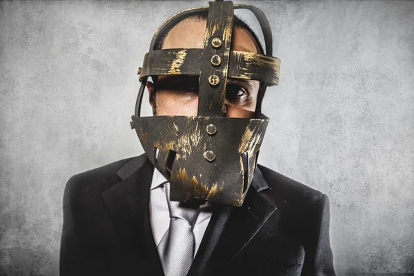 Dangerous business man with iron mask — Stock Photo, Image