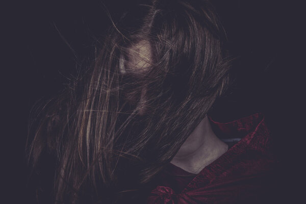 Young girl with hair flying