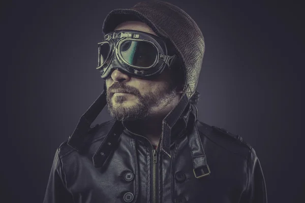 Pilot dressed in vintage style leather cap — Stock Photo, Image