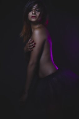 Young, sensitive, naked woman