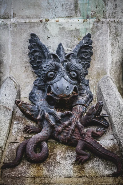 Bronze sculpture with demonic gargoyles — Stock Photo, Image