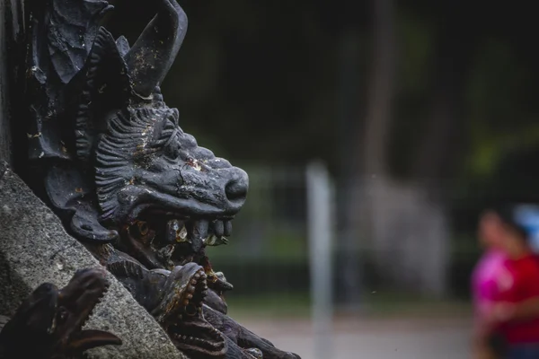 Bronze sculpture with demonic gargoyles — Stock Photo, Image