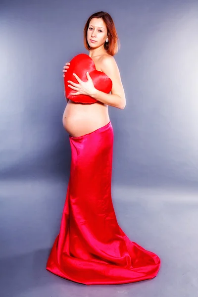 Beauty pregnant on black background Stock Photo