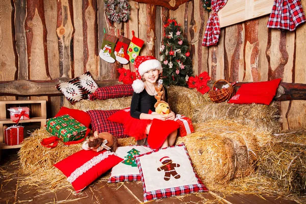 Smiling girl in Santa hat — Stock Photo, Image