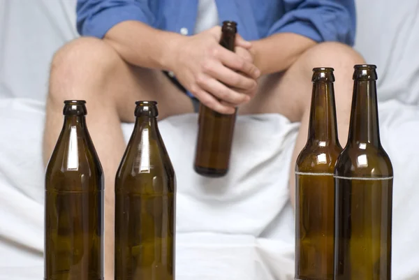 Man with beer bottles — Stok fotoğraf