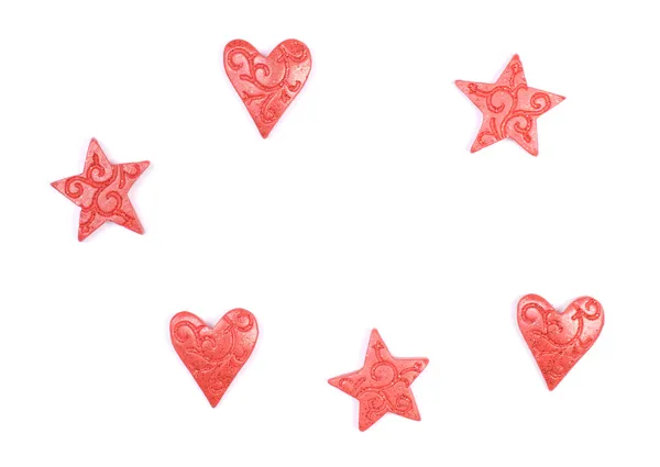 Stjärnor och hjärtan isolerad på vit — Stockfoto