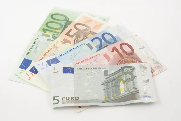 Geld geïsoleerd op wit — Stockfoto