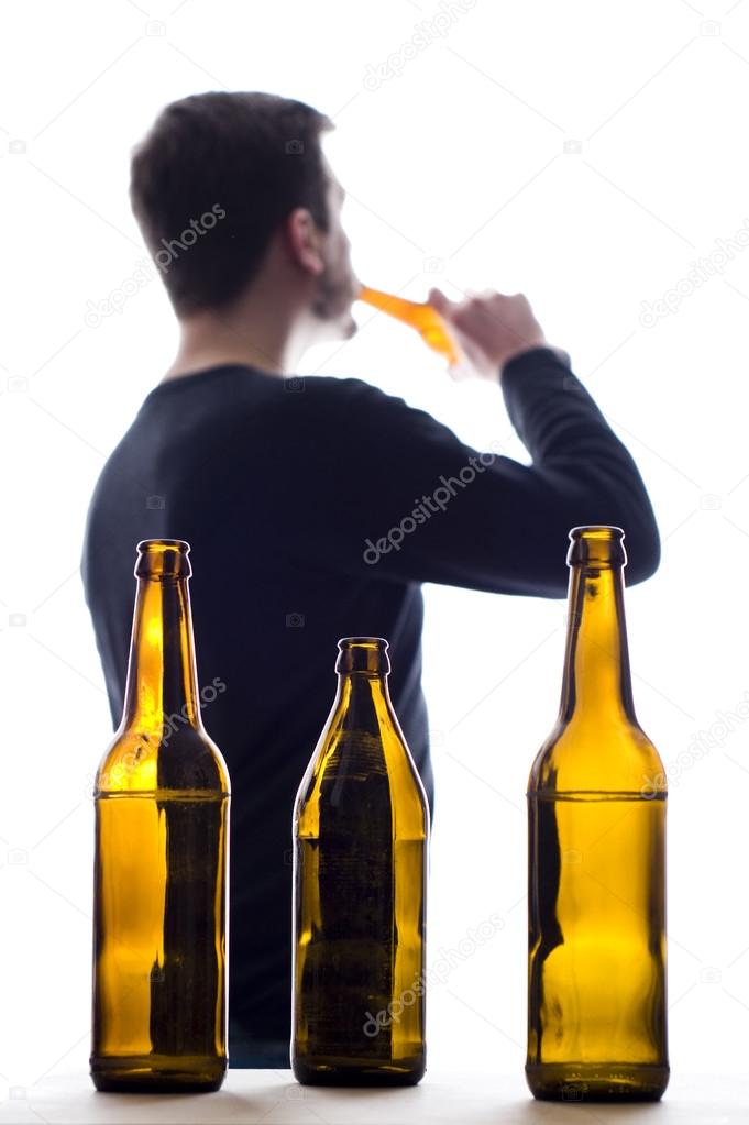 Man and Beer Bottles