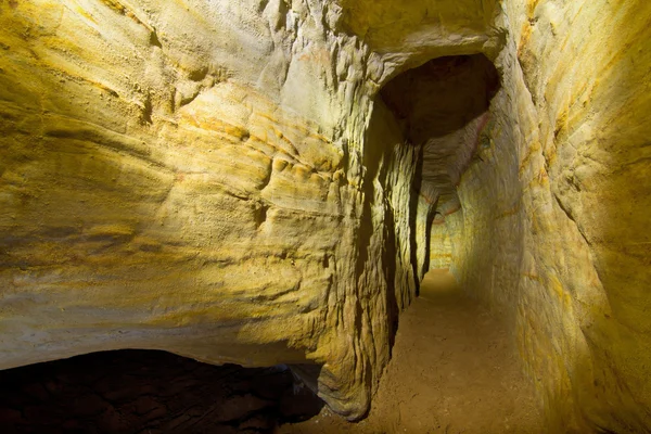 Sand caves in the flashlight light