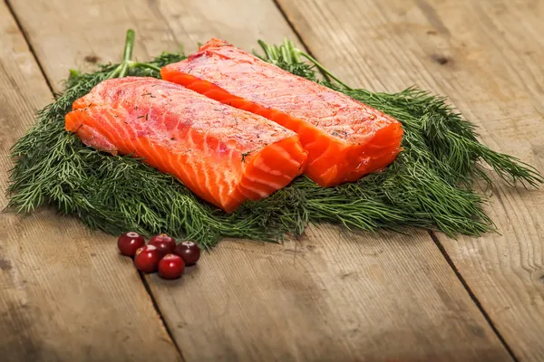 Salty salmon on the old table — Stock Photo, Image