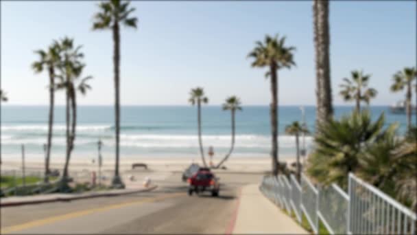 Road to ocean beach California USA. Summertime palm trees. Summer coast near Los Angeles. Sea waves. — Stock Video