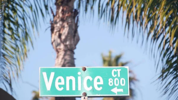 Venice beach street road sign, California city, USA. Tourist resort, palm trees — Stock Photo, Image