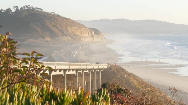Bridge on pacific coast highway, Torrey Pines beach sunset, California road trip