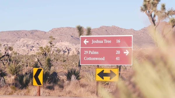 Crossroad sign, road intersection, California USA. Joshua Tree desert wilderness