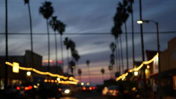 Palm trees in Ocean Beach, lights in twilight, California coast, San Diego, USA. — Stock Photo, Image