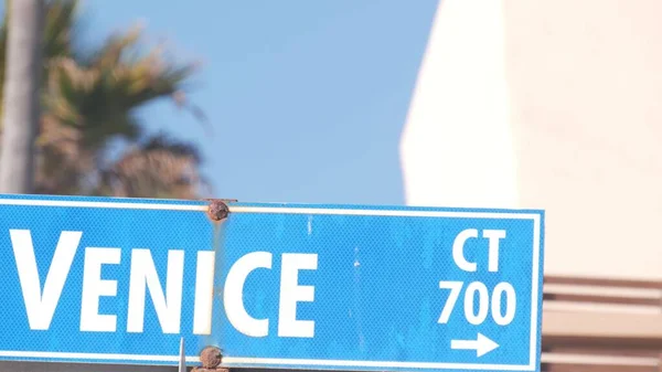 Venice beach street road sign, California city, USA. Tourist resort, palm trees — Stock Photo, Image