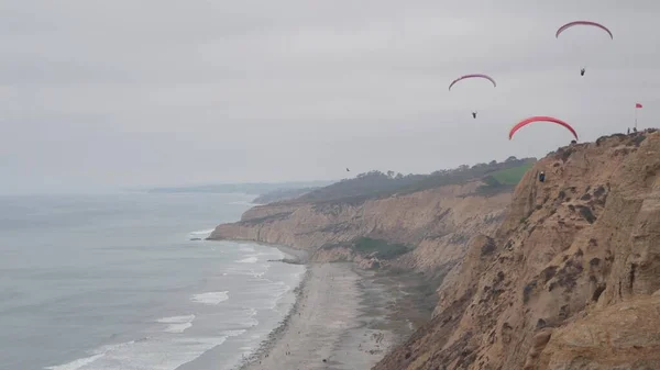 People Paragliding Torrey Pines Cliff Bluff Paraglider Soaring Sky Air Stock Picture