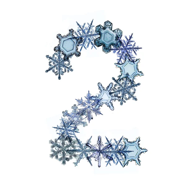 Font from snowflakes and ice crystals — Stock Photo, Image