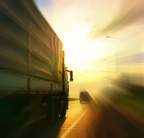 Truck on blurry road — Stock Photo, Image