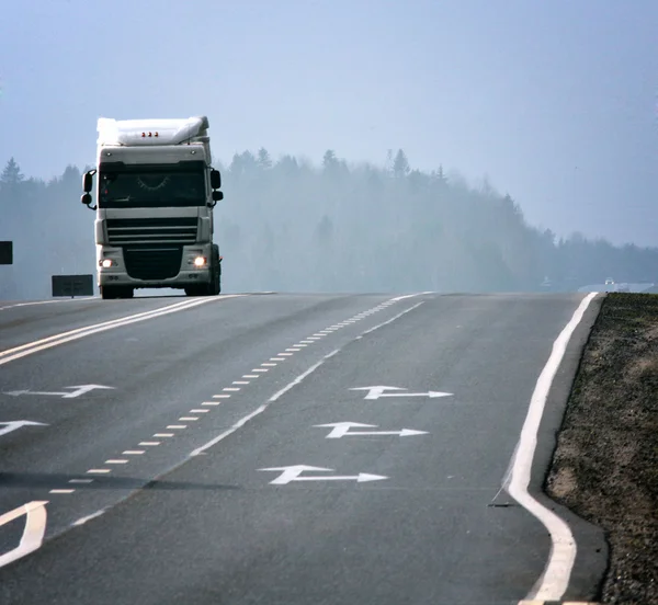 Highway with cars in the country in the autumn — Stock Photo, Image