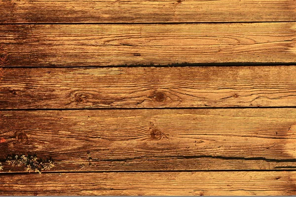 Oude borden, een muur van houten huis, de achtergrond — Stockfoto