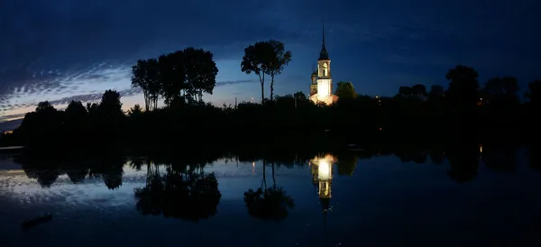 Illuminated at night Church on the River — Stock Photo, Image