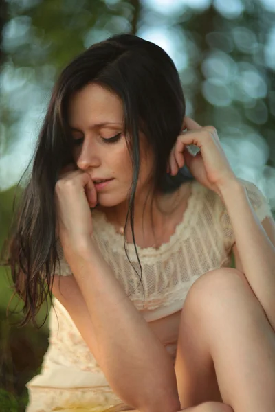 Portrait of young beautiful woman on nature — Stock Photo, Image