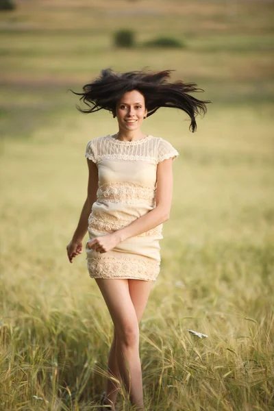 Portrait of romantic woman in the field — Stock Photo, Image