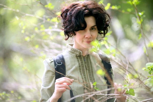 Portrait of brunette girl in the woods — Stock Photo, Image