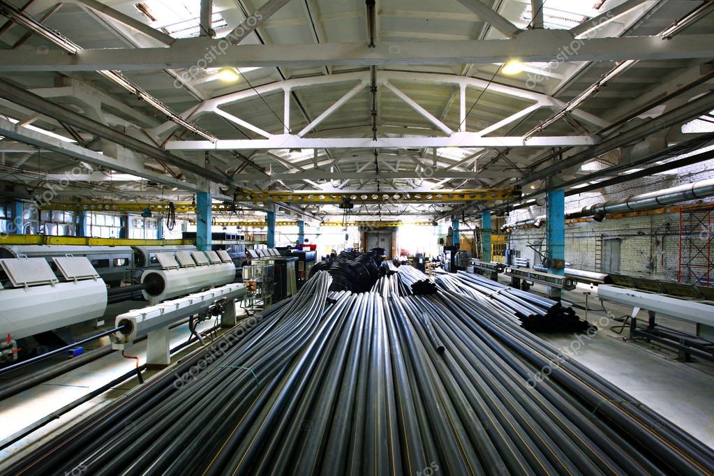 Plumbing pipes factory Stock Photo by ©xload 28269927