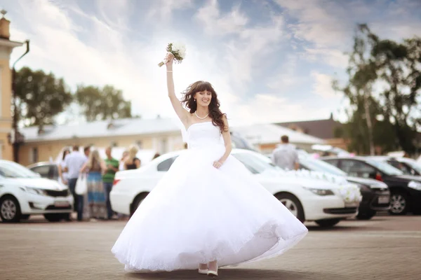 Bride at a wedding in a white dress — Stock Photo, Image